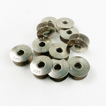 Bobbin for embroidery machines